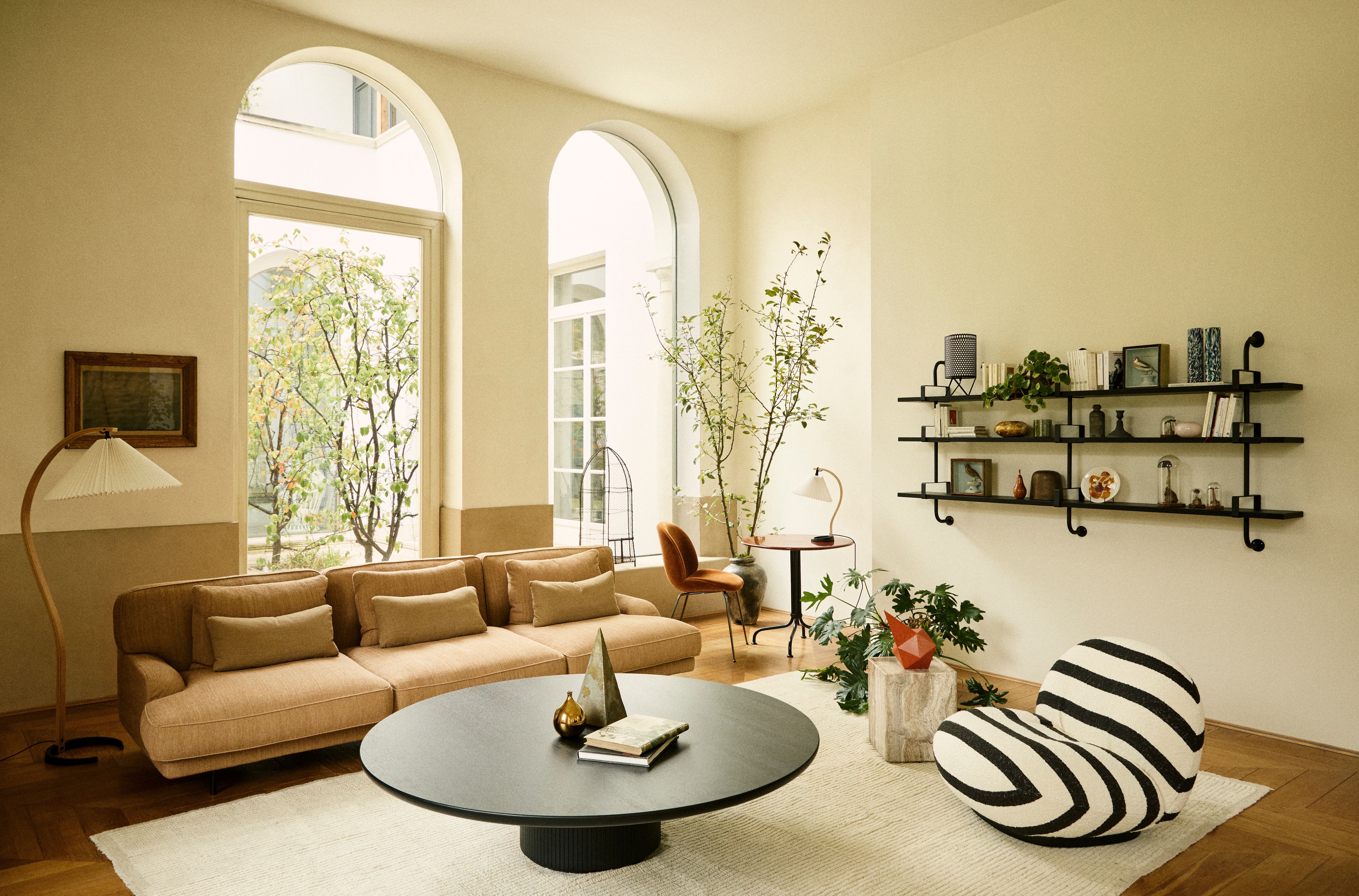 gubi-spring2025-campaign-005-2-pacha-lounge-chair-by-pierre-paulin